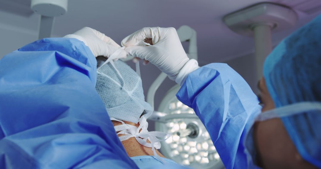 Doctors Preparing for Surgery in Operating Room - Free Images, Stock Photos and Pictures on Pikwizard.com