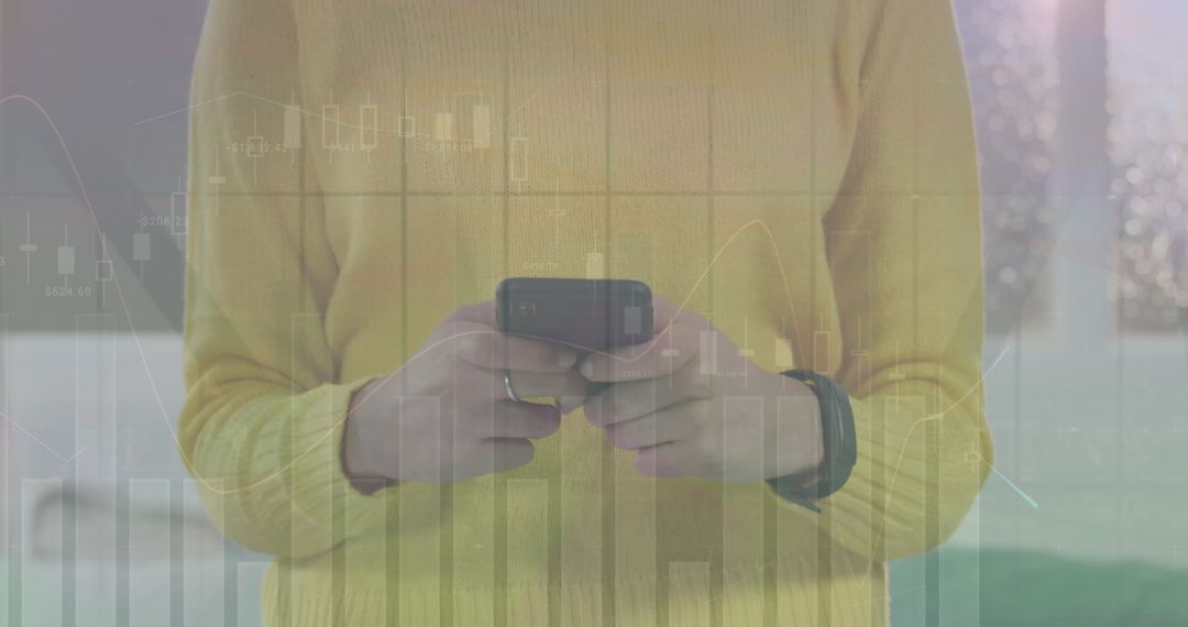 Person Analyzing Financial Data on Smartphone in Urban Environment