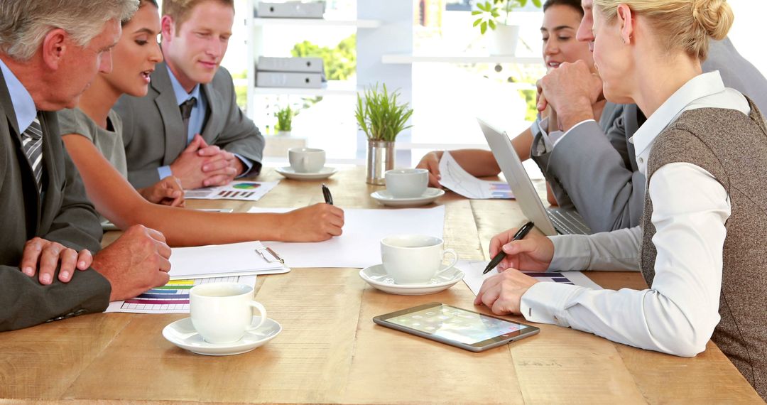 Diverse Business Team Engaging in Productive Meeting