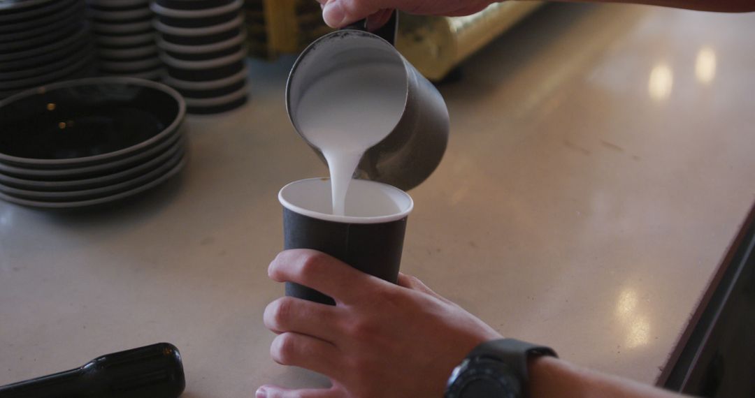 Barista Pouring Steamed Milk into Paper Coffee Cup - Free Images, Stock Photos and Pictures on Pikwizard.com