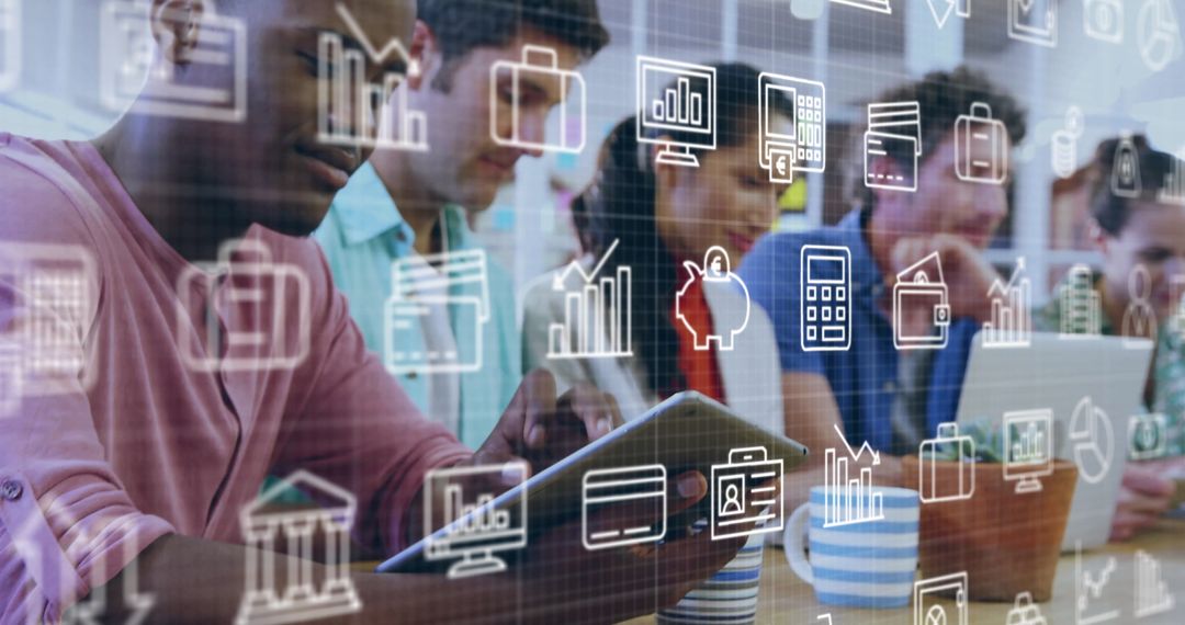 Diverse Team Utilizing Technology for Innovation in Modern Office