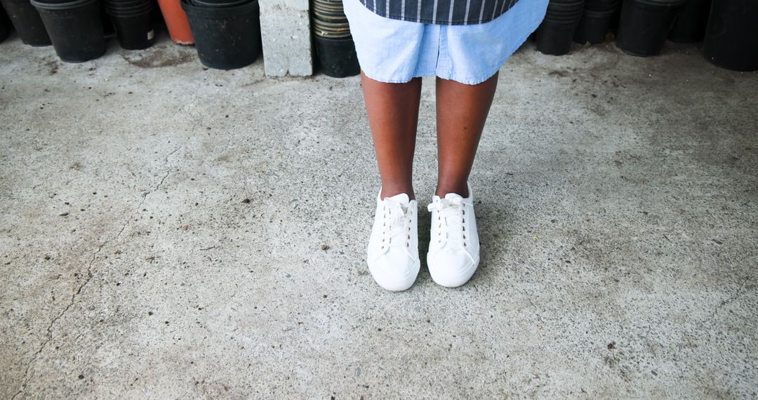 Casual Style Scene with Canvas Sneakers on Concrete Floor