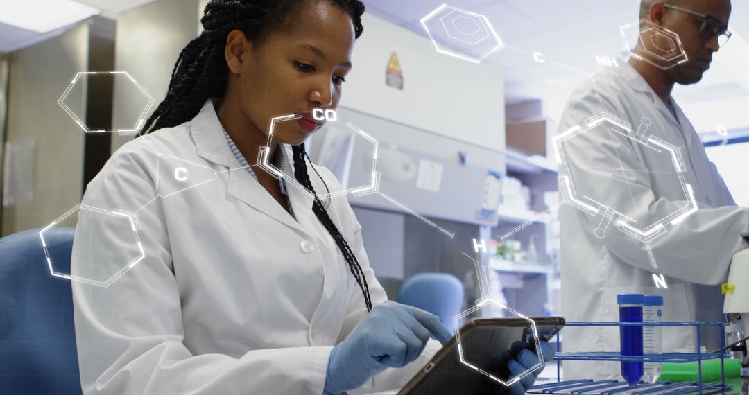 Scientist Analyzing Data on Tablet in Modern Laboratory