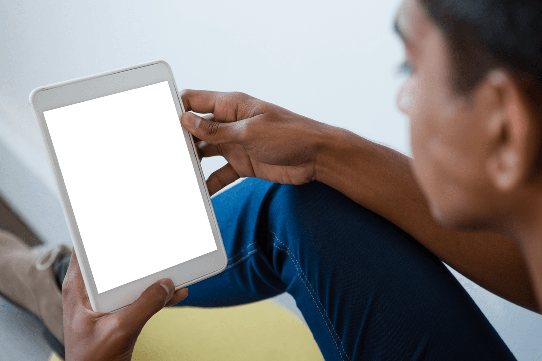 Close-Up View Man Using Transparent Tablet at Home Interior