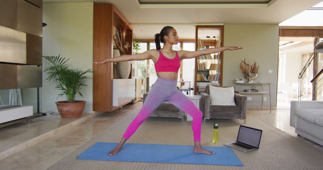 Woman Practicing Yoga at Home in Modern Living Room - Free Images, Stock Photos and Pictures on Pikwizard.com