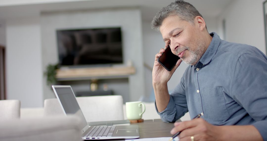 Professional Man Working from Home on Phone Call - Free Images, Stock Photos and Pictures on Pikwizard.com