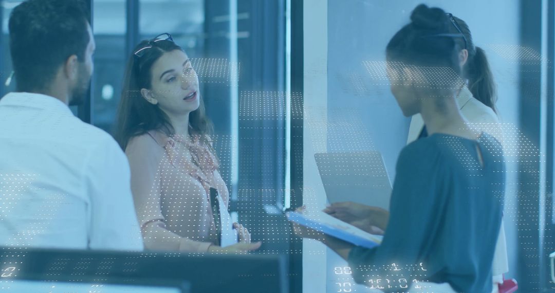 Professional Colleagues in Discussion in High-Tech Office Setting