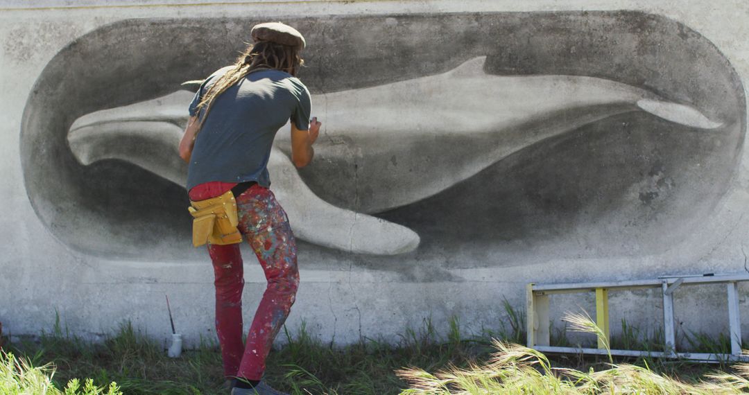 Street Artist Painting Whale Mural on Wall - Free Images, Stock Photos and Pictures on Pikwizard.com