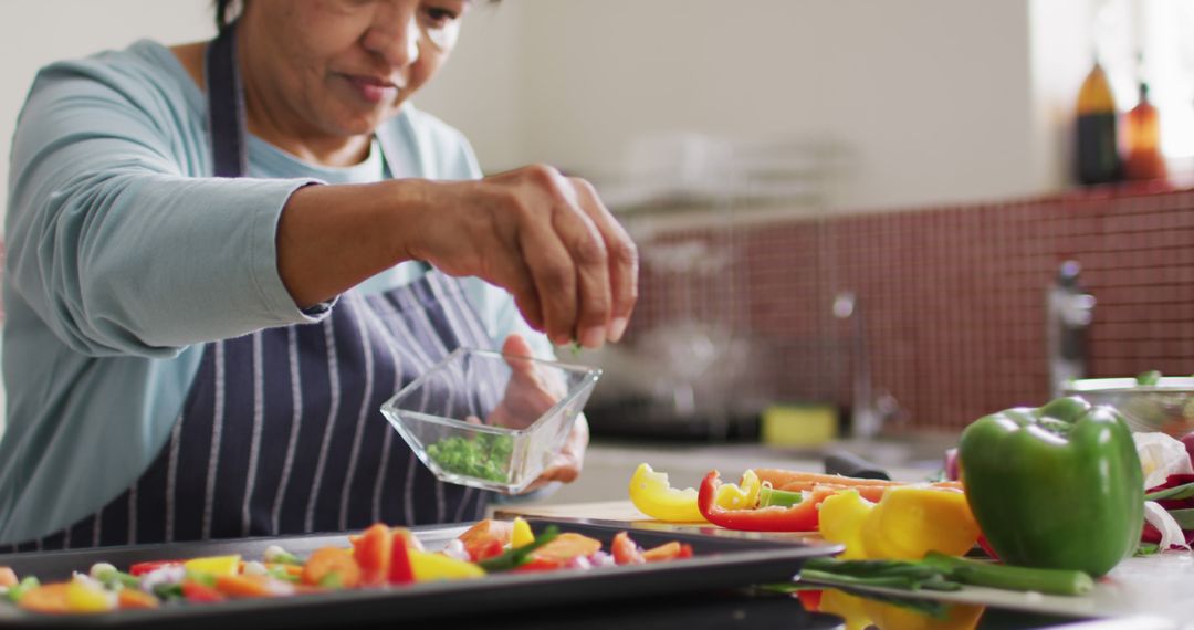 Woman Preparing Healthy Meal with Fresh Vegetables - Free Images, Stock Photos and Pictures on Pikwizard.com