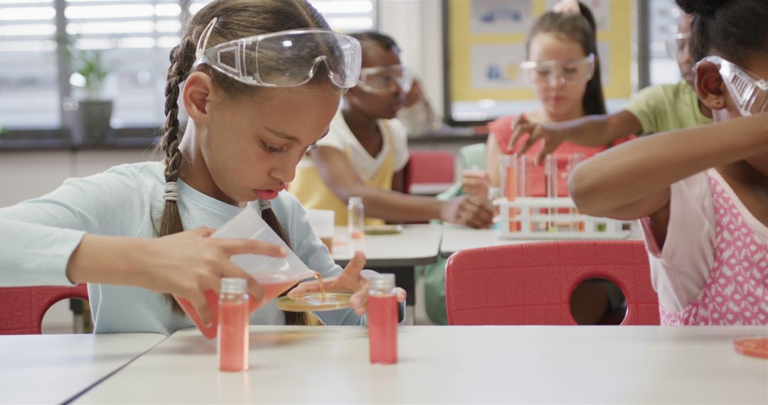 Focused Students Conducting Science Experiment in Classroom - Free Images, Stock Photos and Pictures on Pikwizard.com