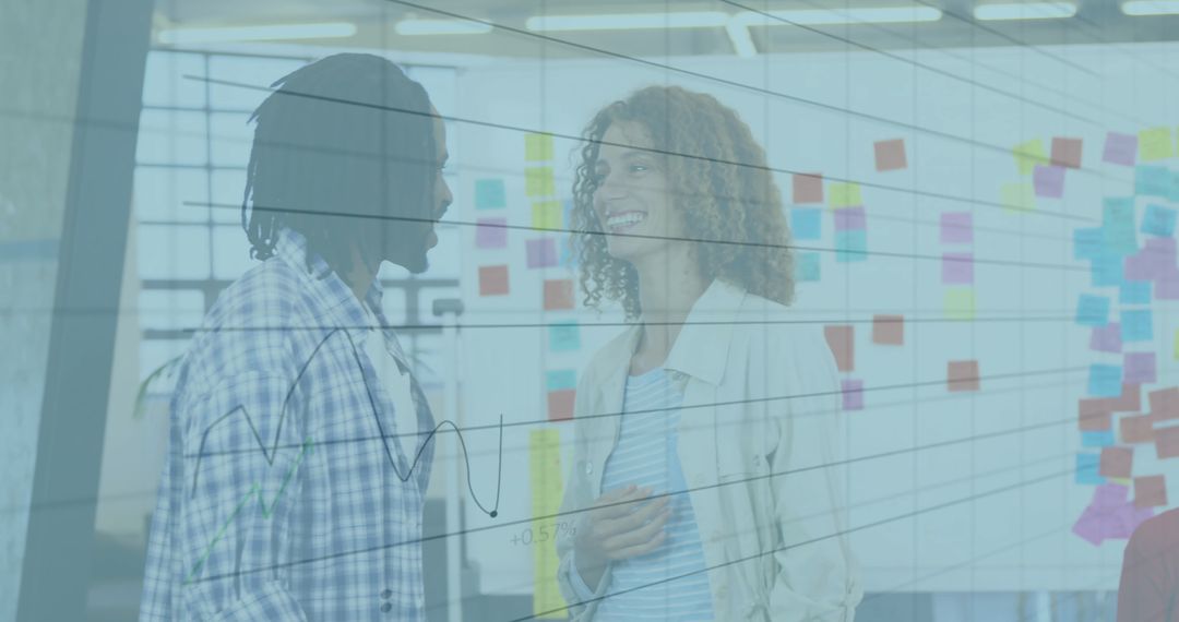 Business Professionals Collaborating with Financial Data Overlay