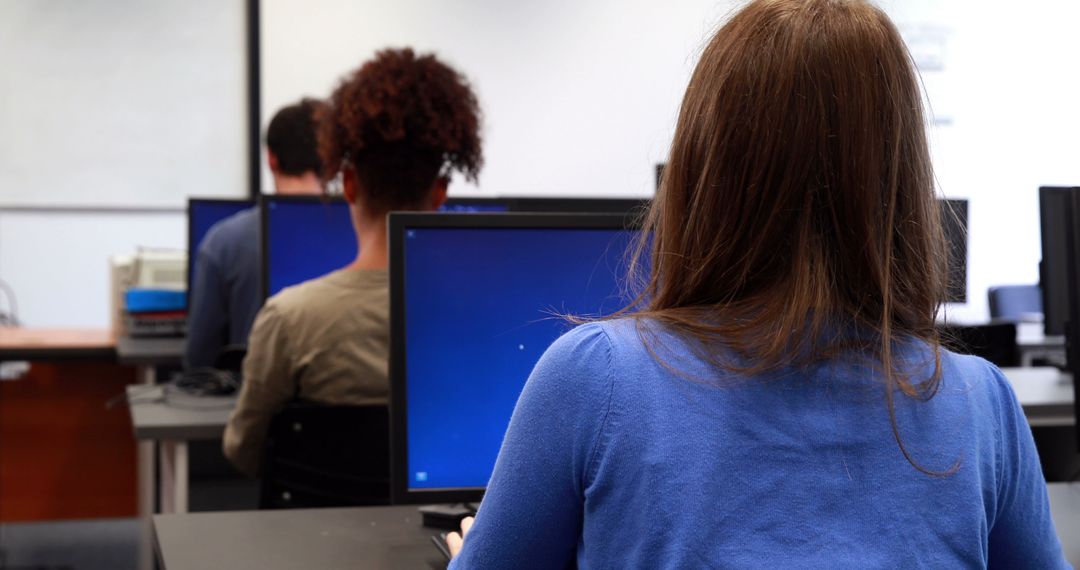 Students working in computer room in high quality 4k format - Free Images, Stock Photos and Pictures on Pikwizard.com