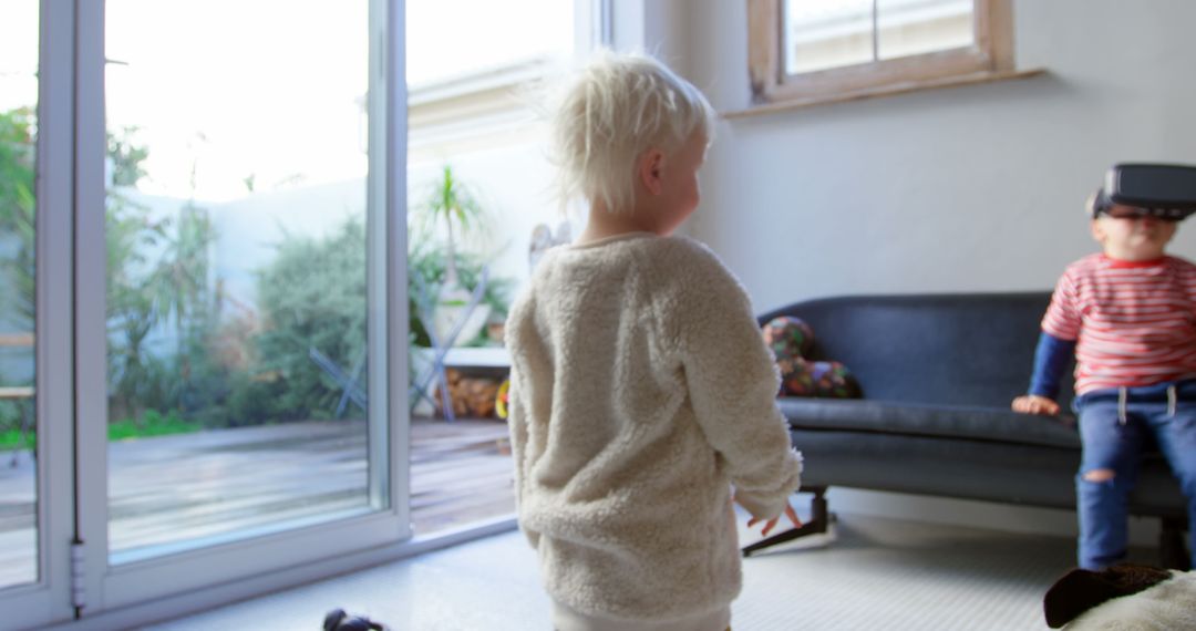 Siblings Experiencing Virtual Reality at Home with Pet Dog