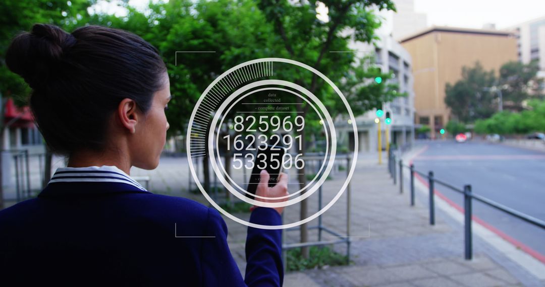 Businesswoman Looking at Technology Overlay Display