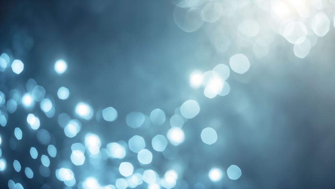 Glowing Blue and White Abstract Bokeh Background