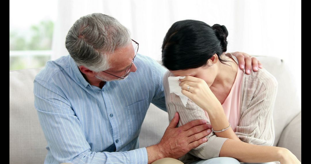 Comforting Older Man Consoles Crying Woman - Free Images, Stock Photos and Pictures on Pikwizard.com