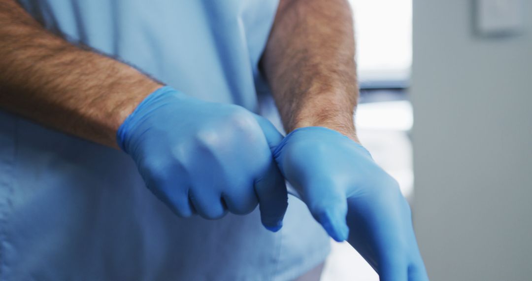 Medical Professional Wearing Blue Protective Gloves for Hygiene - Free Images, Stock Photos and Pictures on Pikwizard.com