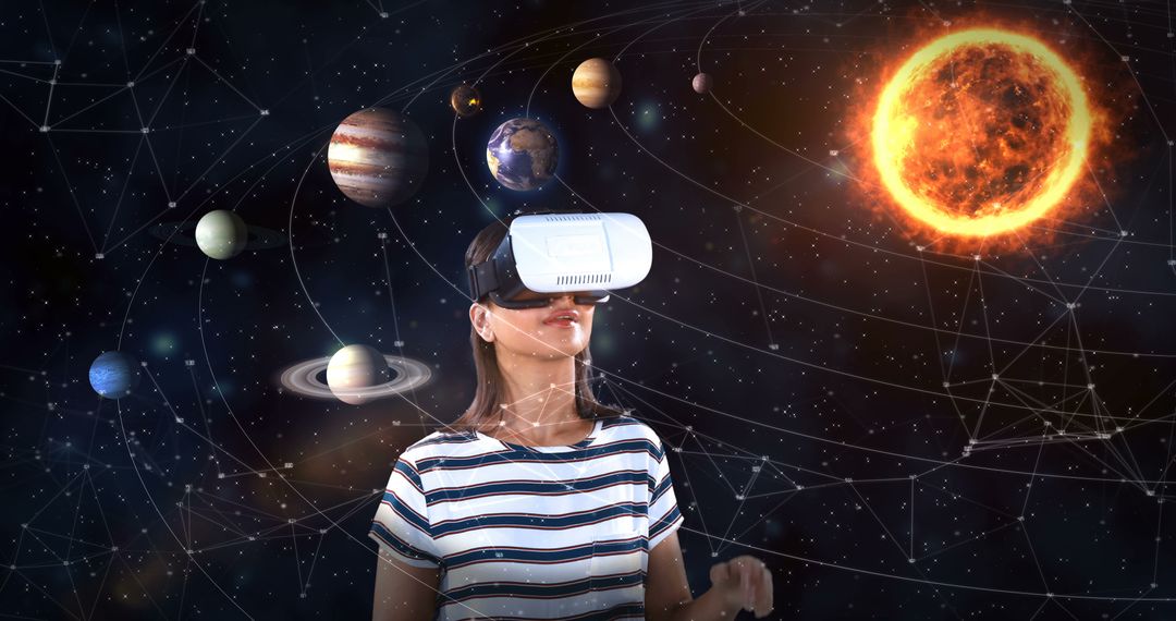 Woman Exploring Virtual Solar System Through VR Headset - Free Images, Stock Photos and Pictures on Pikwizard.com