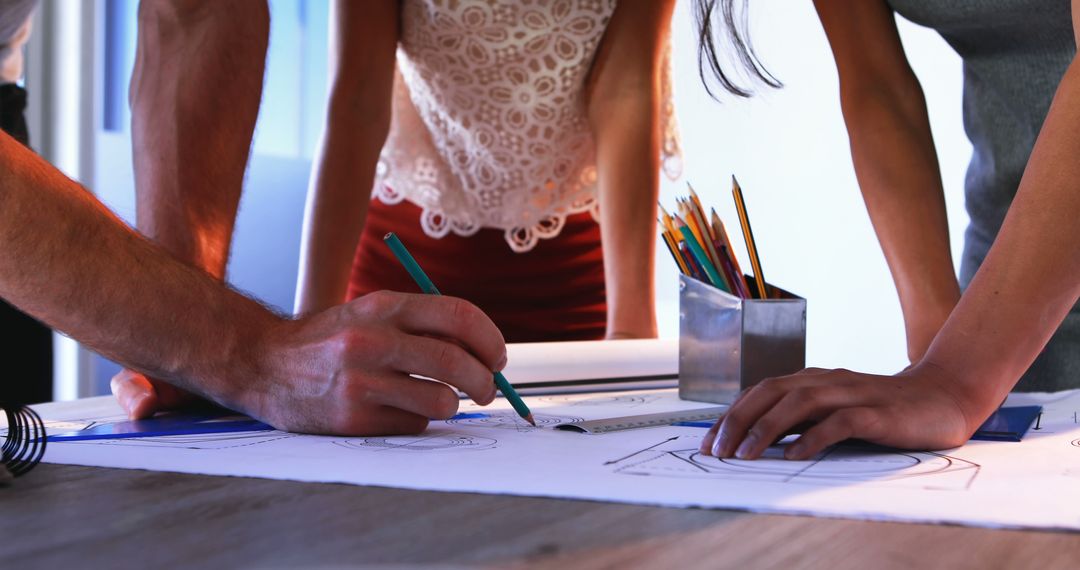 Collaboration of Professionals Over an Architectural Blueprint