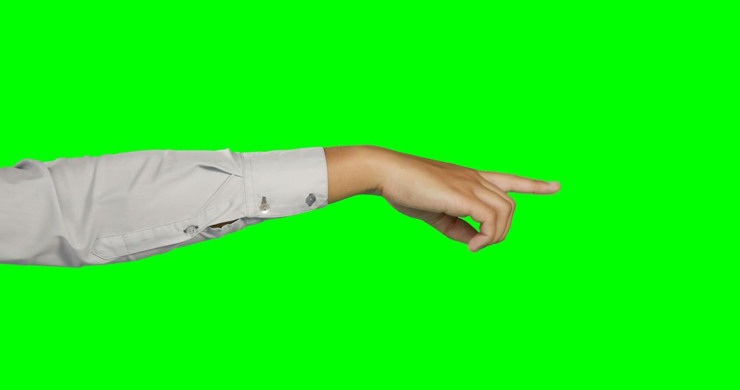 An image of a Caucasian hand pointing on a green screen offers a flexible space for designs. - Free Images, Stock Photos and Pictures on Pikwizard.com