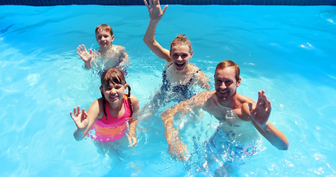 Happy Family Swimming Together in Outdoor Pool on Sunny Day - Free Images, Stock Photos and Pictures on Pikwizard.com