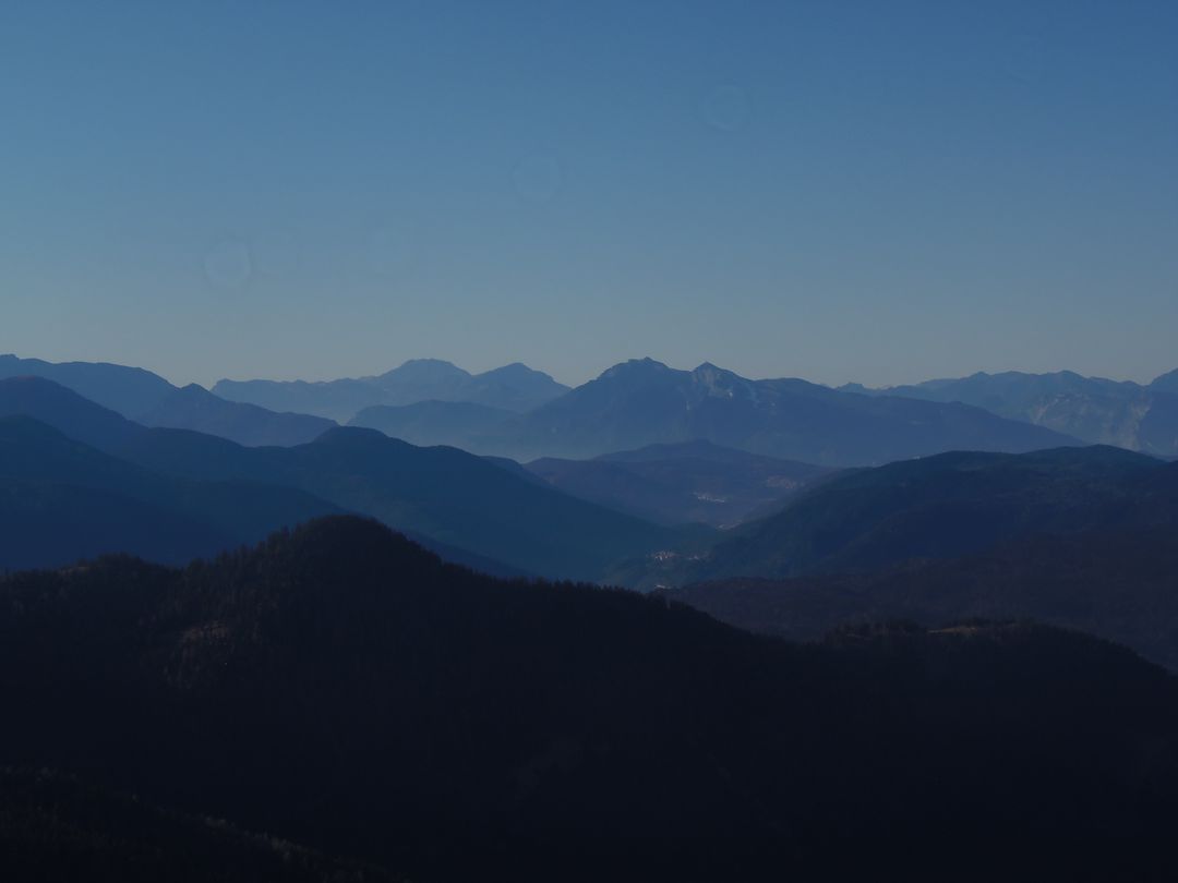 Serene Mountain Range at Dusk with Forested Hills - Free Images, Stock Photos and Pictures on Pikwizard.com