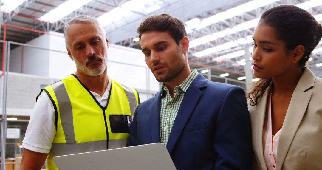 Diverse Warehouse Team Collaborating on Logistics