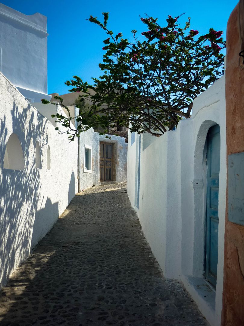 Tranquil Alley in Greek Village with Whitewashed Walls