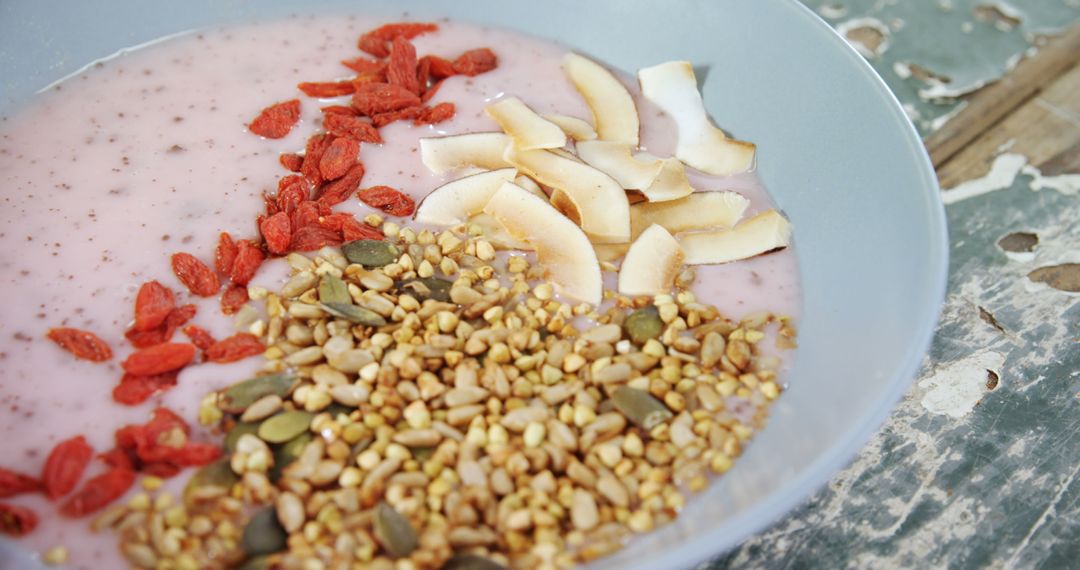 Close-Up of Smoothie Bowl with Assorted Toppings on Rustic Table - Free Images, Stock Photos and Pictures on Pikwizard.com