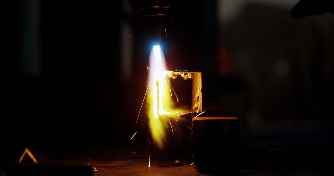 Close-up of Welding Torch with Sparks in Industrial Setting - Free Images, Stock Photos and Pictures on Pikwizard.com