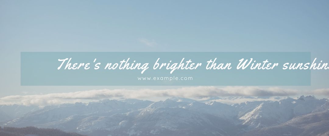 Serene Snow-Capped Mountains Under Clear Winter Sky