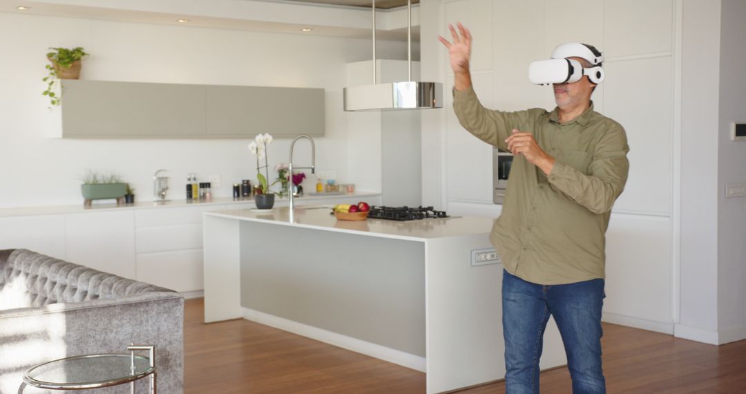 Man Experiencing Virtual Reality in Modern Kitchen Interior