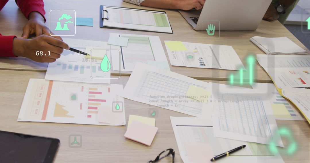 Team Analyzing Business Reports with Digital Interface in Modern Office