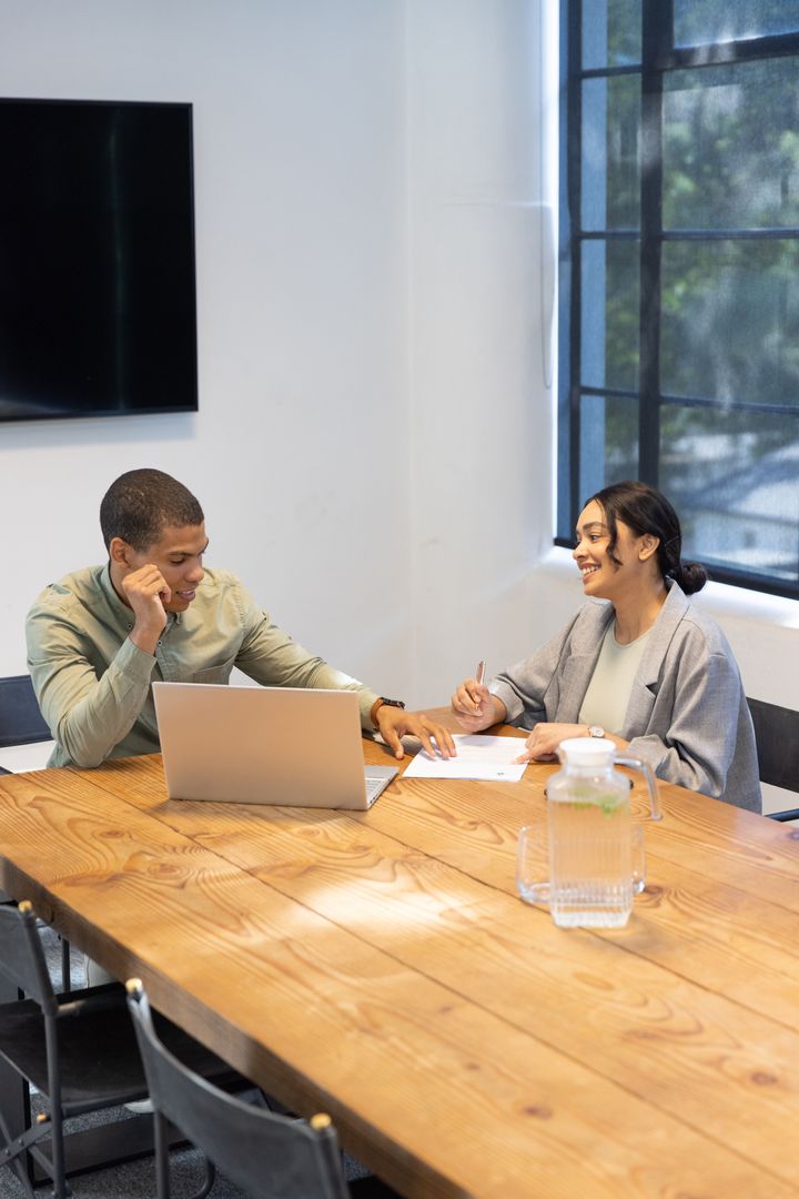Diverse Colleagues Collaborating in Contemporary Office Setting