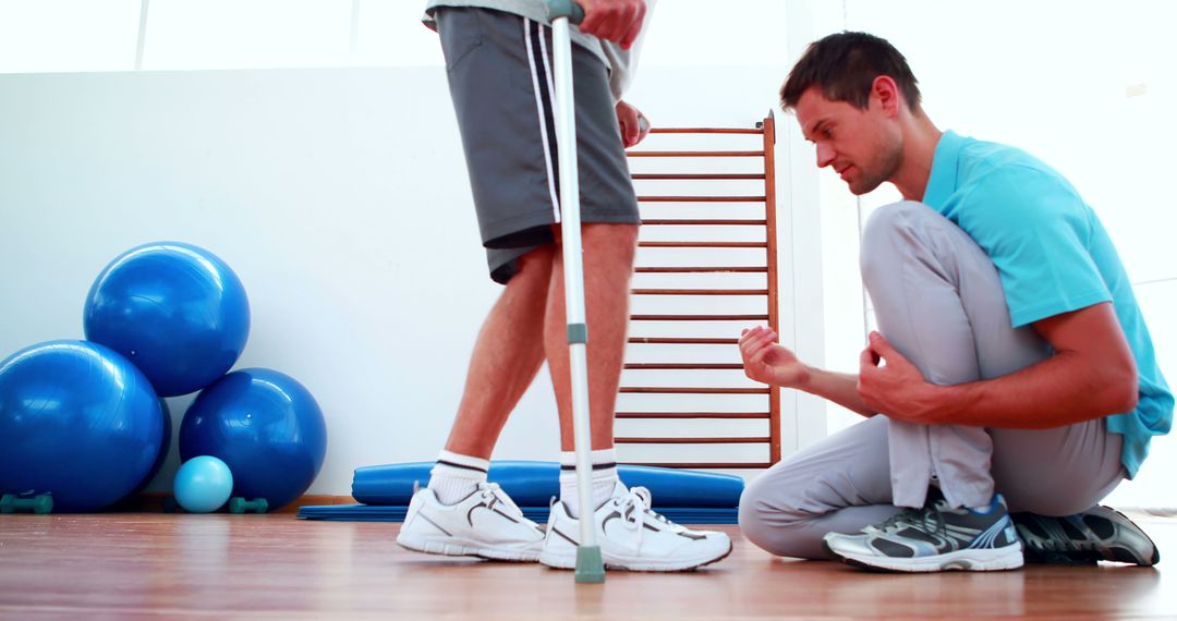 Physical Therapist Assisting Patient in Rehabilitation Exercises - Free Images, Stock Photos and Pictures on Pikwizard.com