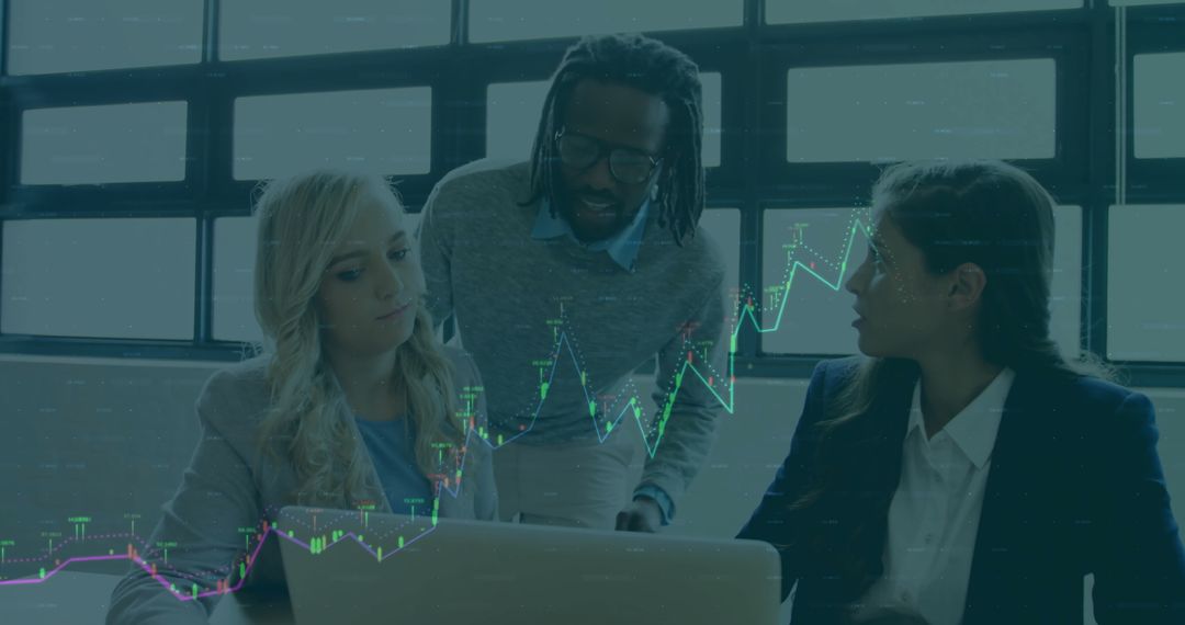 Diverse Professionals Analyzing Financial Data in Modern Office Setup