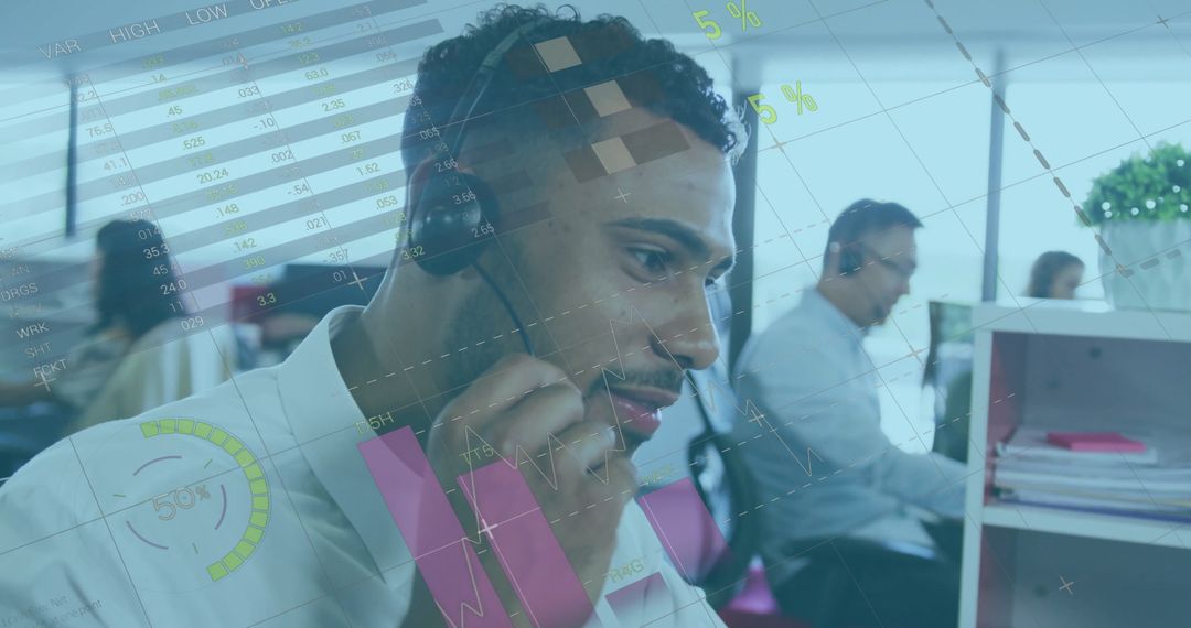 Businessman Using Headset in Call Center with Overlaid Data Graphics