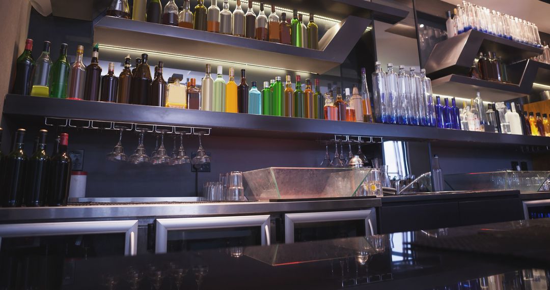 Modern Bar Interior with Colorful Bottles on Shelves