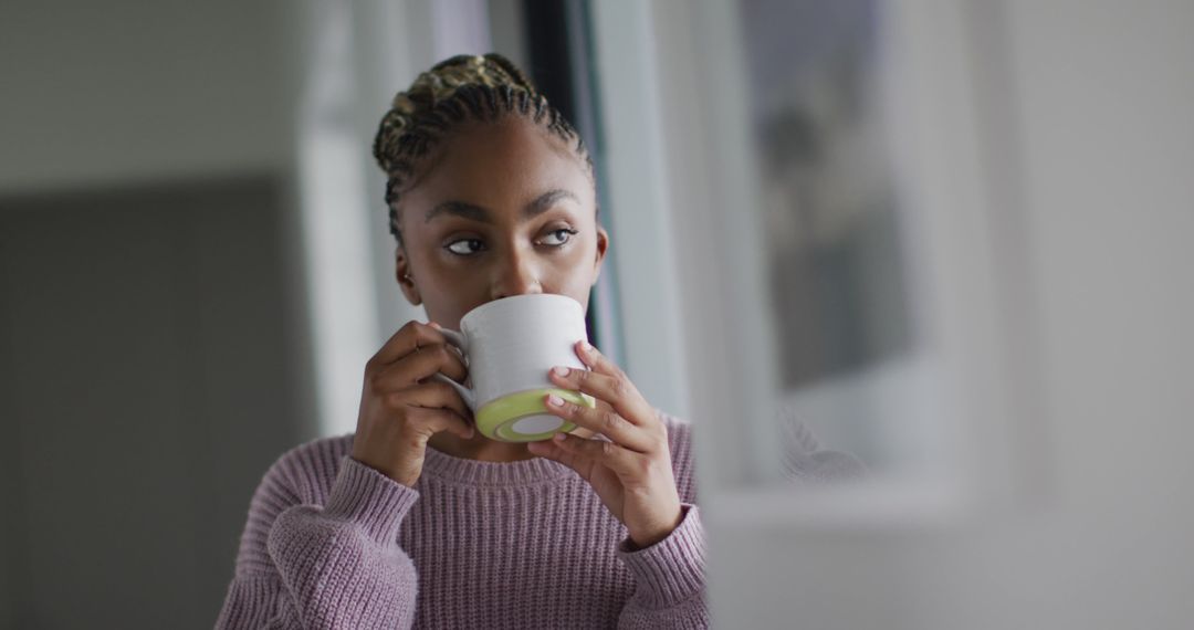 Woman Drinking Coffee at Home by Window - Free Images, Stock Photos and Pictures on Pikwizard.com