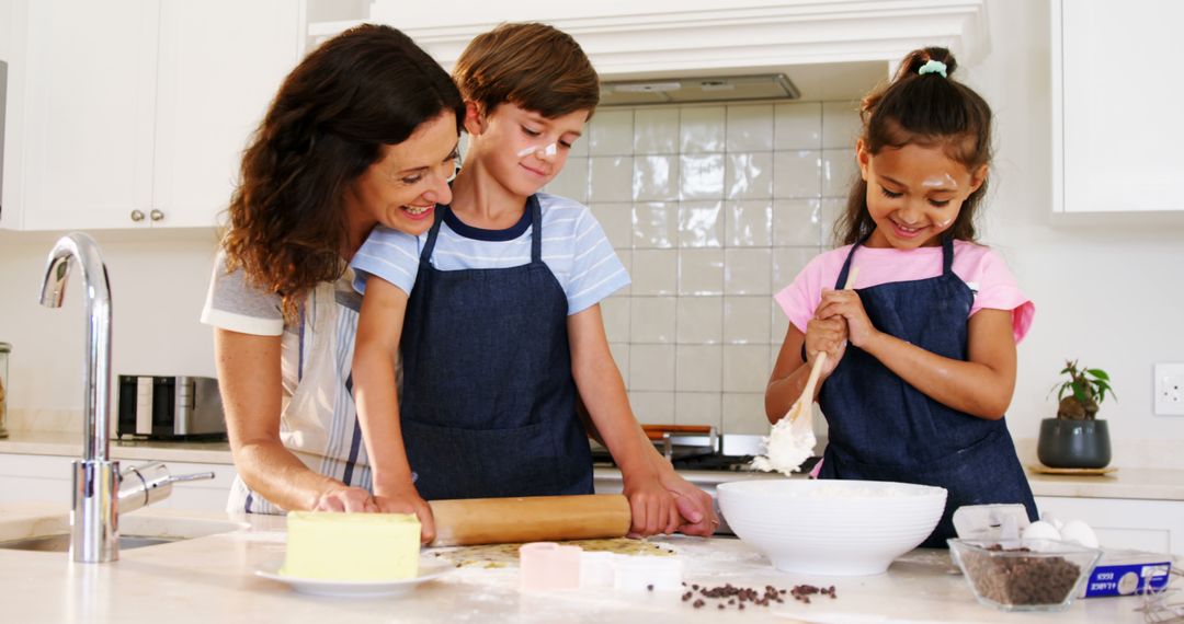 Mother Baking with Children in Modern Kitchen - Free Images, Stock Photos and Pictures on Pikwizard.com