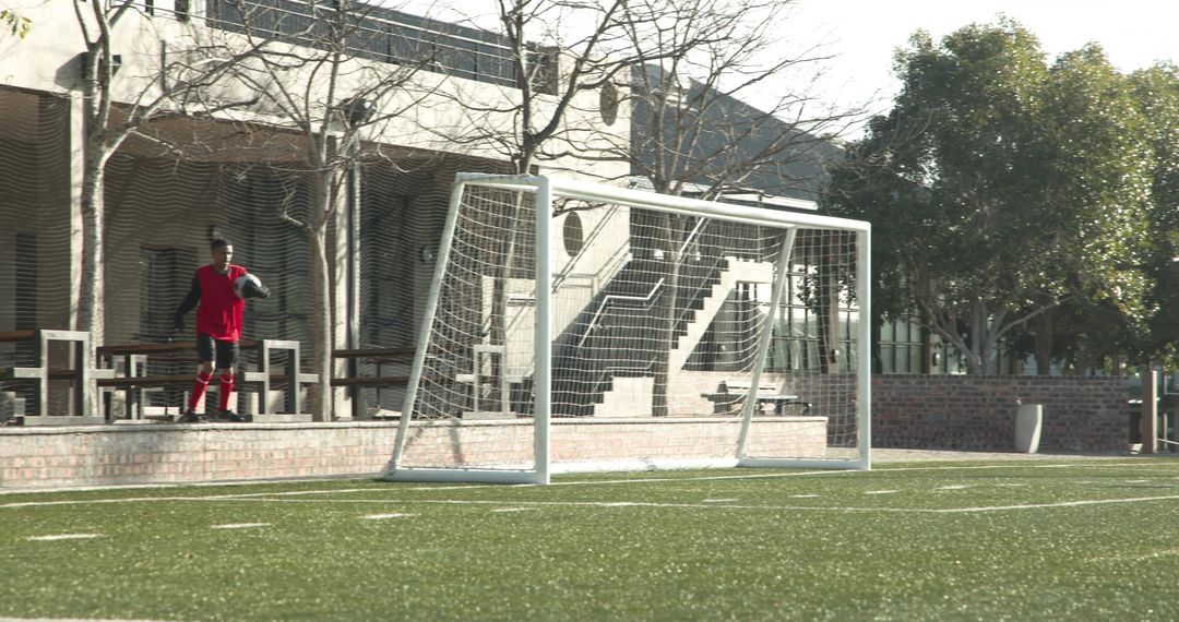 Youth Soccer Players Engaged in Strategic Game on Field