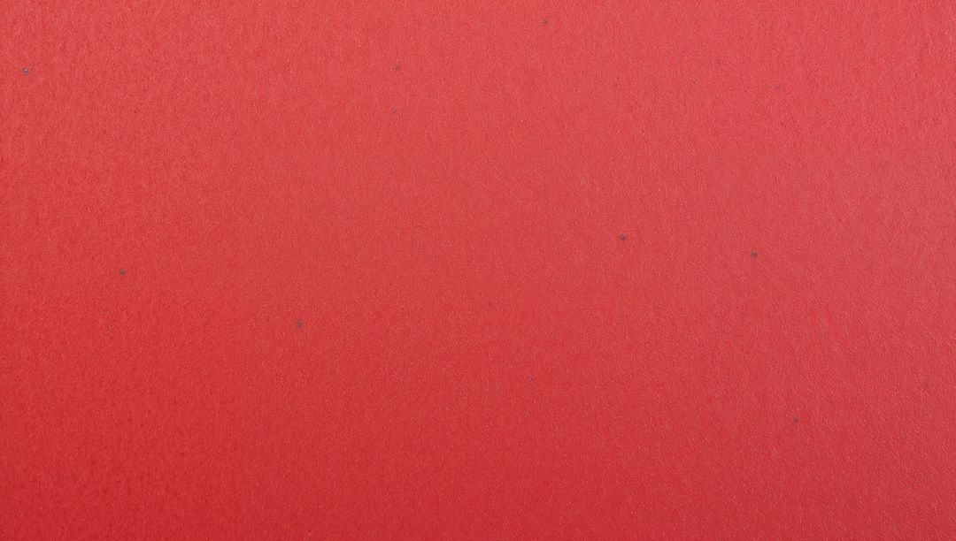 Crimson Textured Wall with Fine Grain and Subtle Specks Minimalist Red Gradient Background