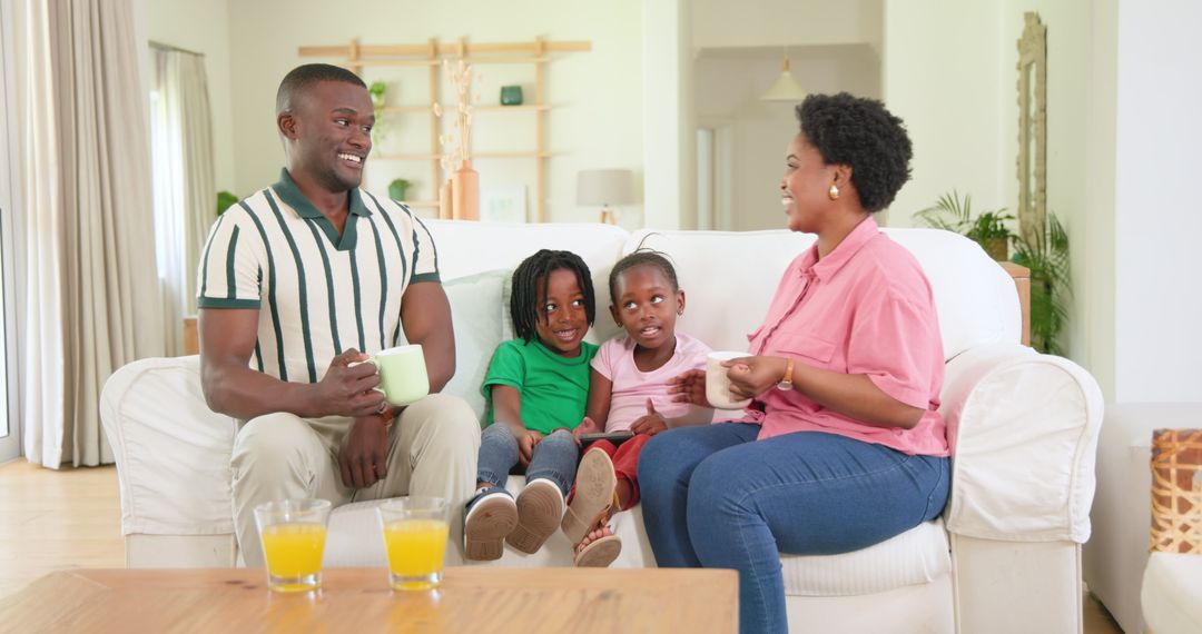 Happy Family Enjoying Time Together on Cozy Couch at Home