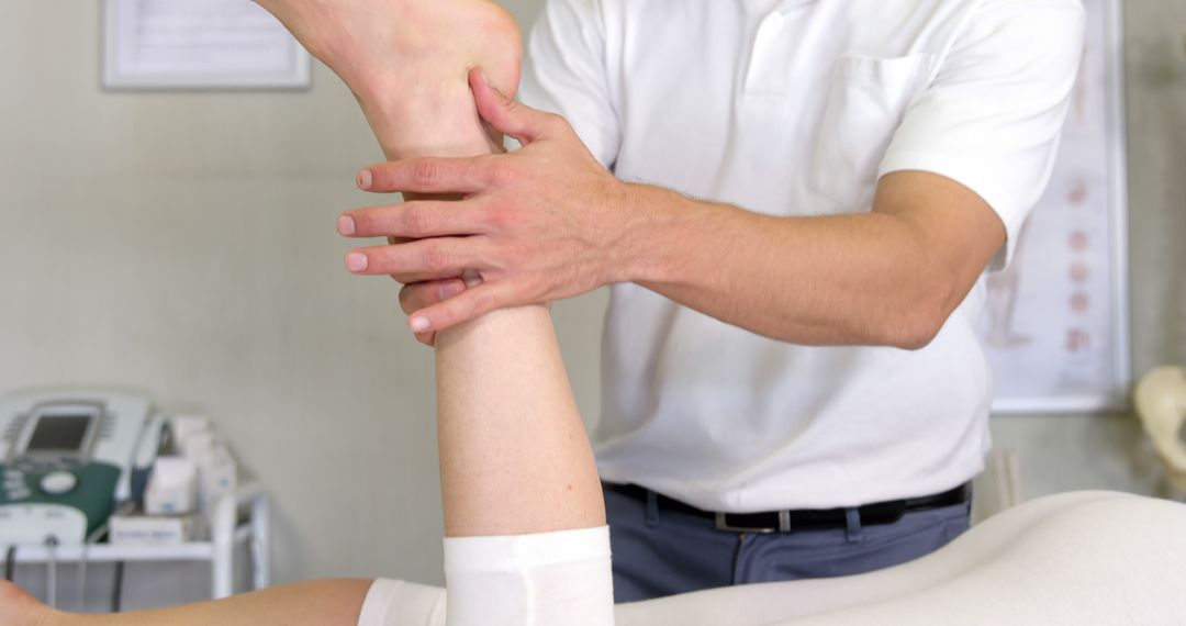 Physical Therapist Conducting Leg Rehabilitation Session with Patient - Free Images, Stock Photos and Pictures on Pikwizard.com