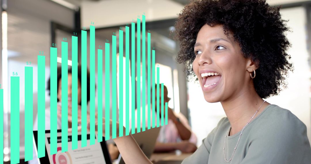 Woman Presenting Data with Teal Bar Chart Overlay in Collaborative Workspace Meeting