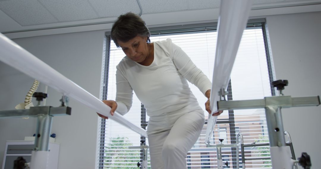 Senior Woman Undergoing Physical Therapy in Rehabilitation Center - Free Images, Stock Photos and Pictures on Pikwizard.com