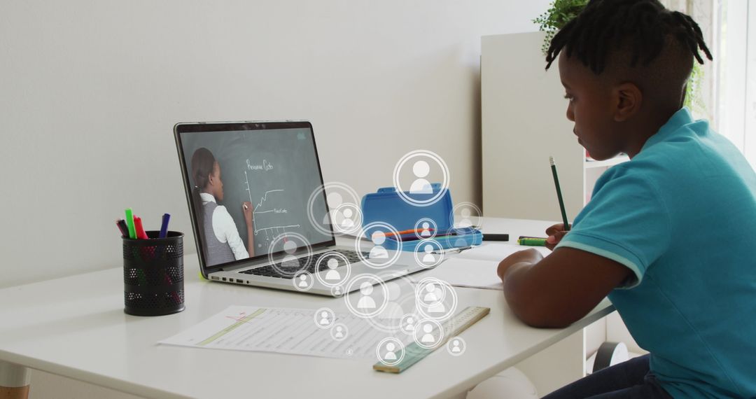 Young Student Engaged in Online Learning at Home