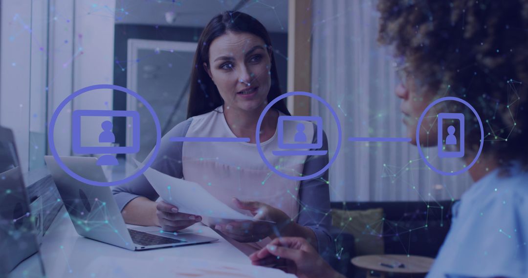 Diverse Coworkers Collaborating in Modern Technology Office