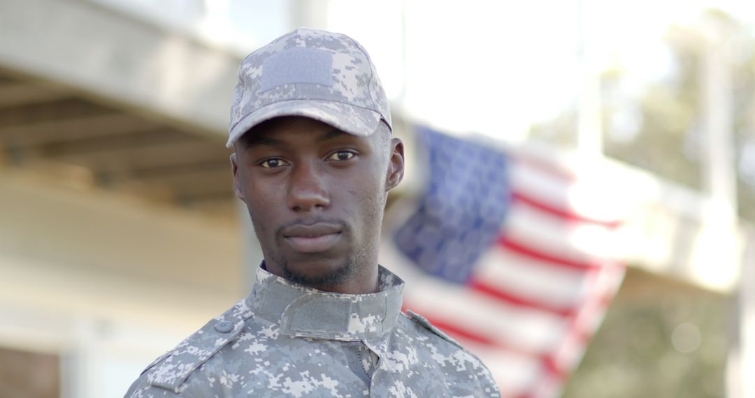 Portrait of a Confident American Soldier with Flag in Background - Free Images, Stock Photos and Pictures on Pikwizard.com