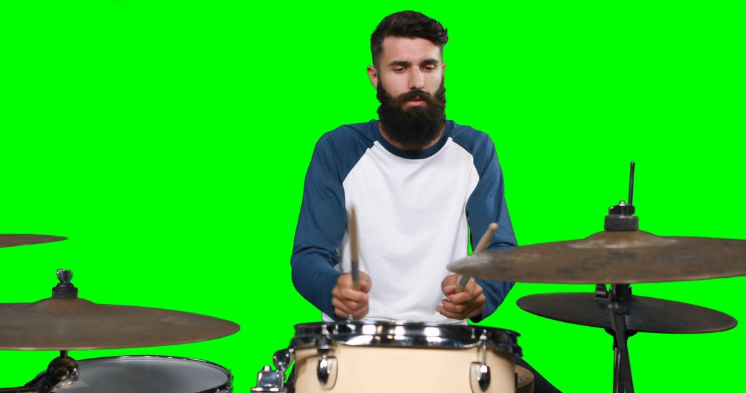 Bearded Man Playing Drums on Green Screen Background - Free Images, Stock Photos and Pictures on Pikwizard.com